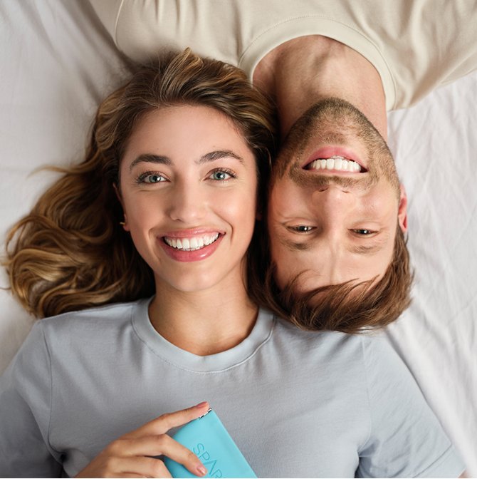 The Spark™ clear aligner system shown in a relaxed everyday setting — Spark brand photography